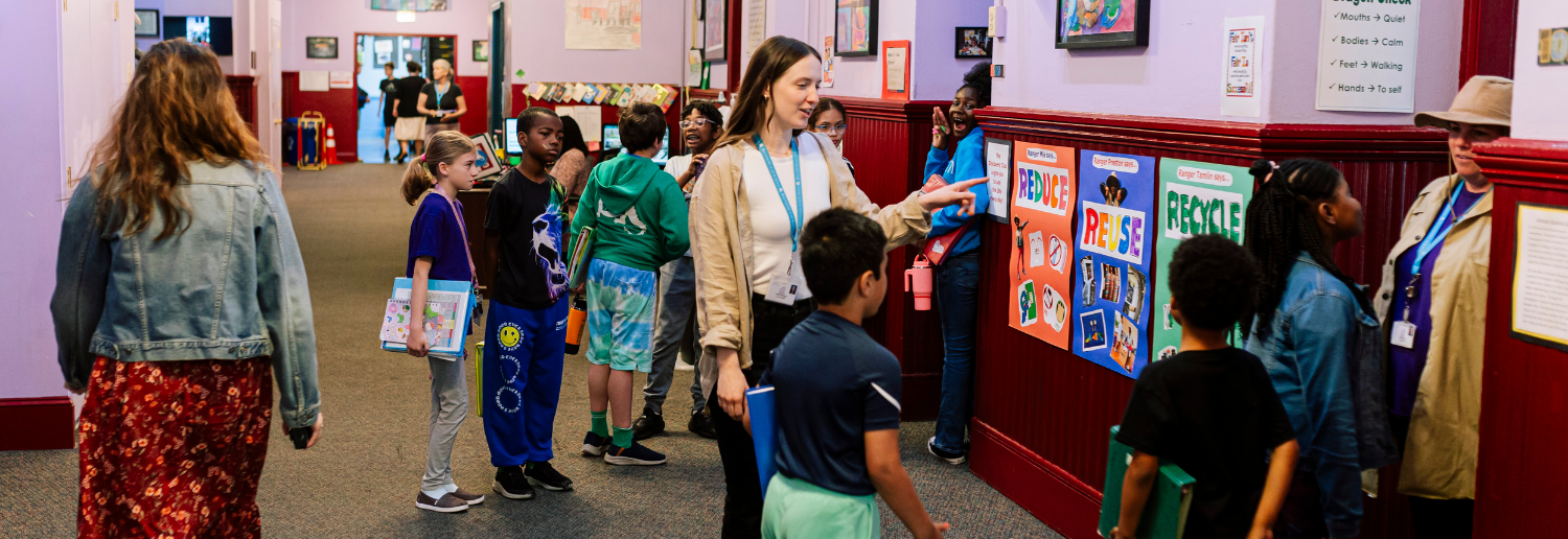 Baltimore Lab students and staff line up for classes in the lobby.