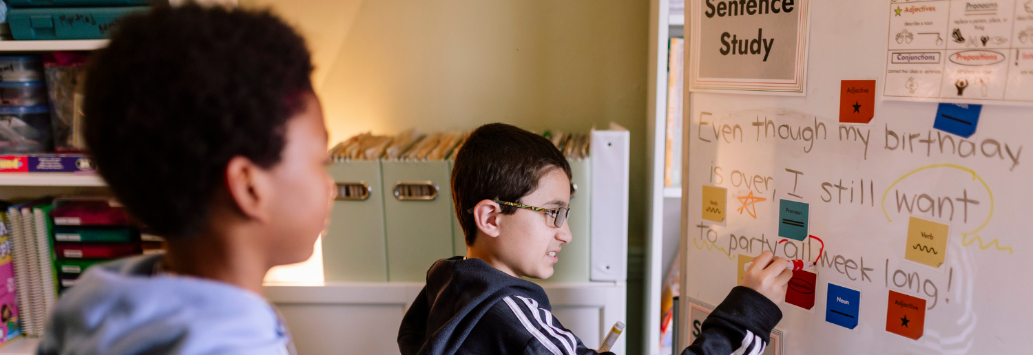 Middle School students work on sentence structure in a Speech-Language Pathology office.